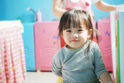 child sitting on the floor